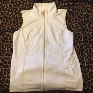 White sleeveless top.